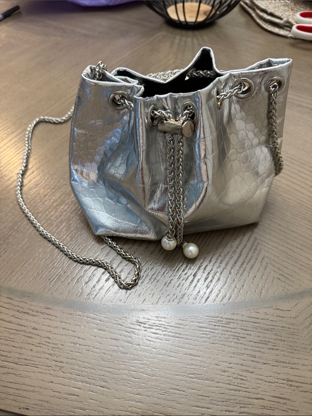 Silver Metallic Drawstring Bucket Bag with Chain Strap